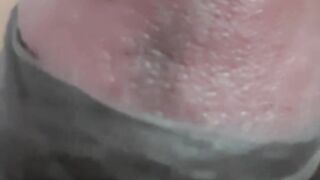 He is taking a moment for self-care in his bedroom.