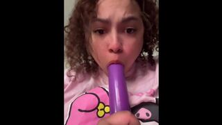 Me sucking my purple dildo
